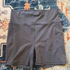 Vuori Women's High-Waisted Blue Bike Shorts